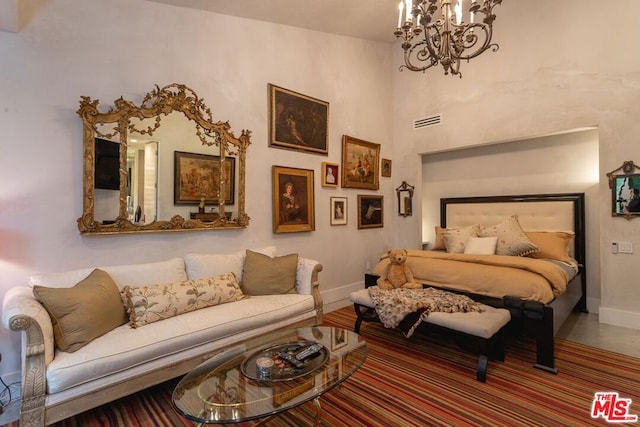 bedroom with an inviting chandelier