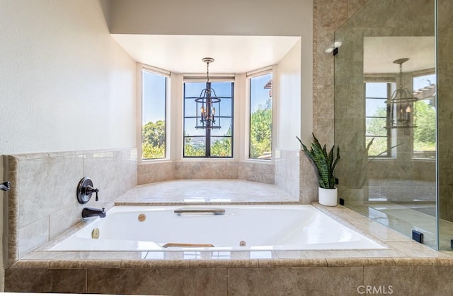 bathroom with tiled tub