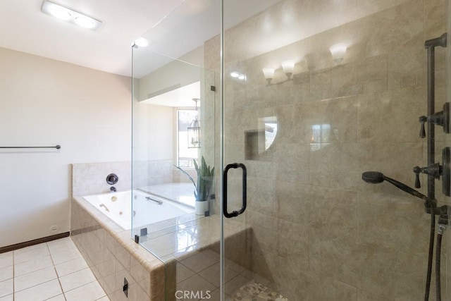 bathroom featuring tile patterned flooring and shower with separate bathtub