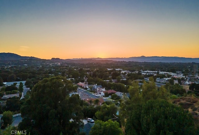 aerial view at dusk with a mountain view