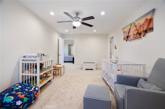 bedroom featuring ceiling fan and carpet flooring