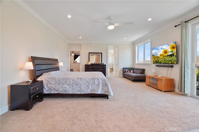 bedroom featuring light carpet, ornamental molding, connected bathroom, and ceiling fan