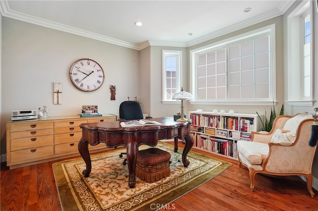 office area with hardwood / wood-style flooring and ornamental molding