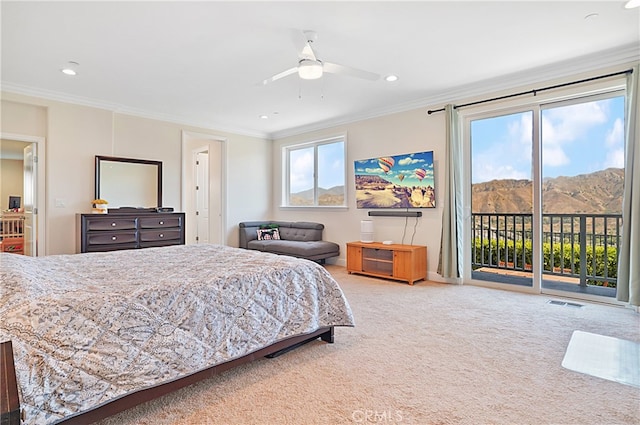 bedroom with access to outside, multiple windows, carpet flooring, and ceiling fan