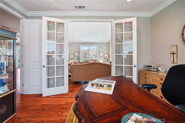 office area featuring french doors, ornamental molding, lofted ceiling, and dark hardwood / wood-style floors