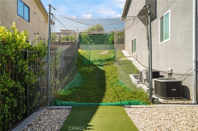 view of yard with central AC unit