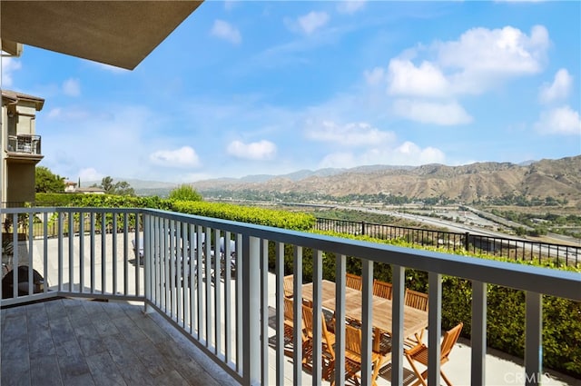 balcony featuring a mountain view