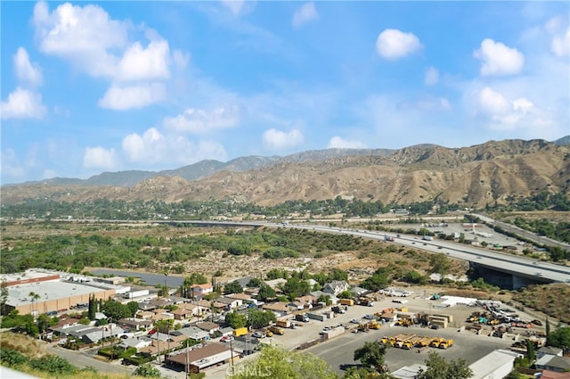 drone / aerial view featuring a mountain view