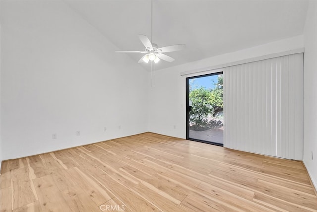 spare room with light wood-type flooring and ceiling fan