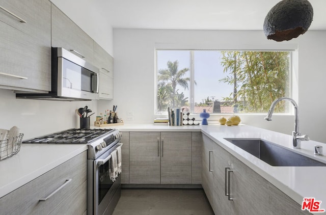 kitchen with sink and stainless steel appliances