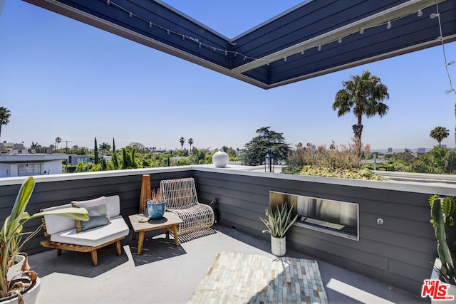 view of patio / terrace featuring a balcony