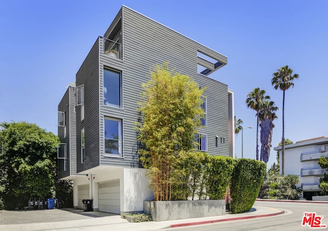 view of property featuring a garage