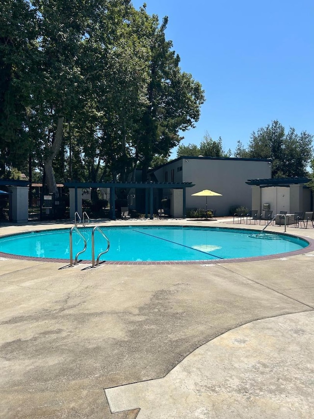 view of pool with a patio