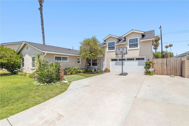 view of front of house featuring a front yard and a garage