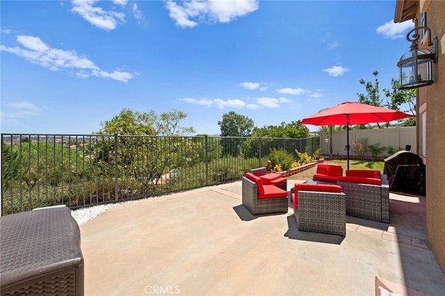 view of patio with outdoor lounge area and area for grilling