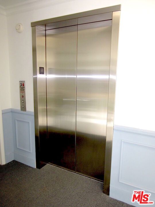 closet featuring elevator