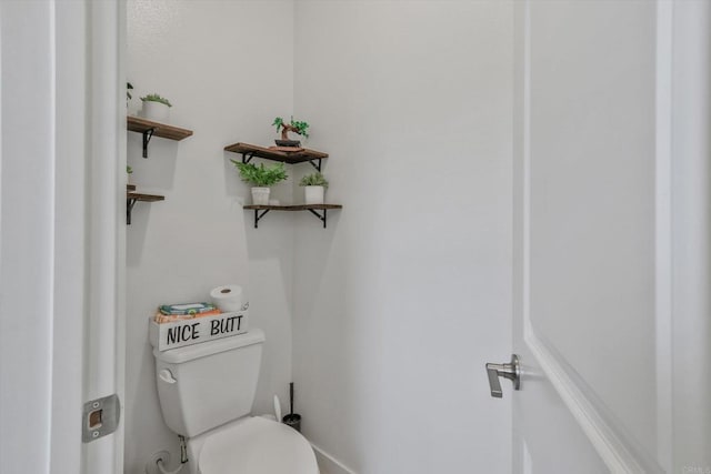 bathroom featuring toilet