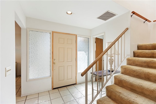 view of tiled foyer entrance