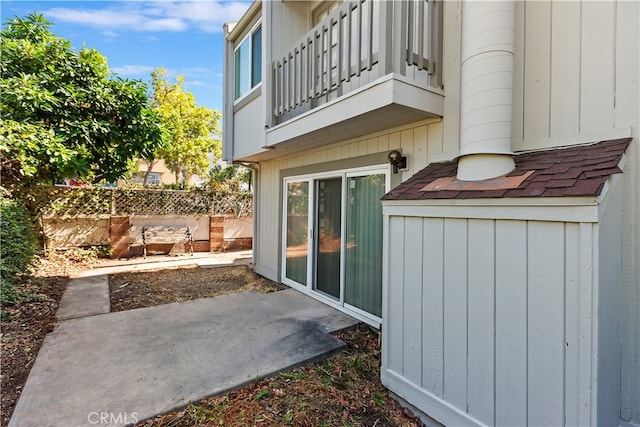 exterior space with a patio and a balcony