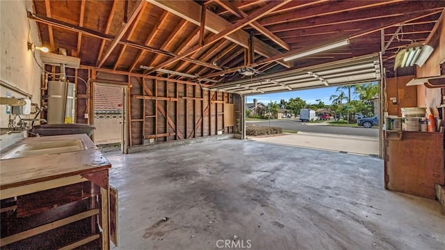 garage featuring gas water heater