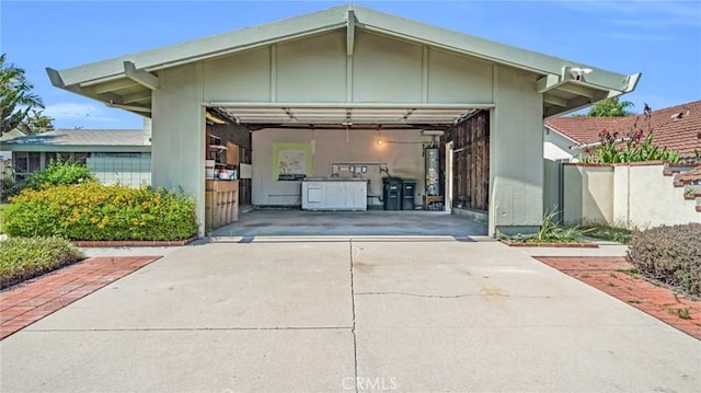 view of home's exterior with gas water heater