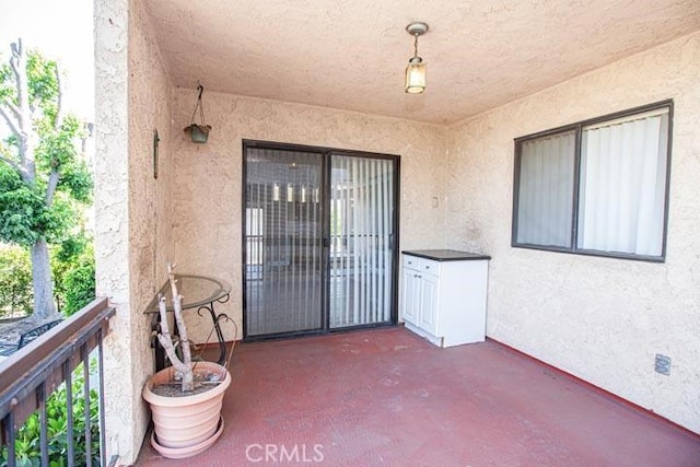 doorway to property with a balcony