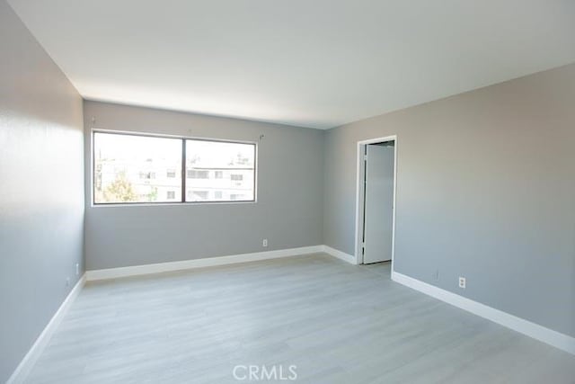 empty room featuring light hardwood / wood-style floors