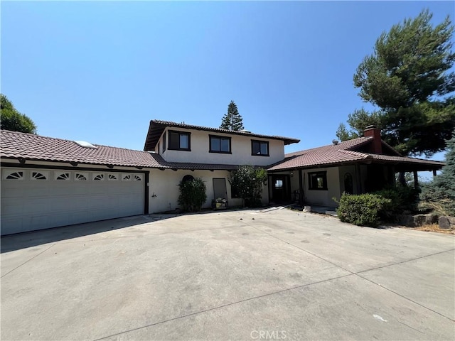 view of front of property featuring a garage