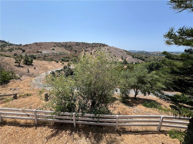 view of mountain feature featuring a rural view