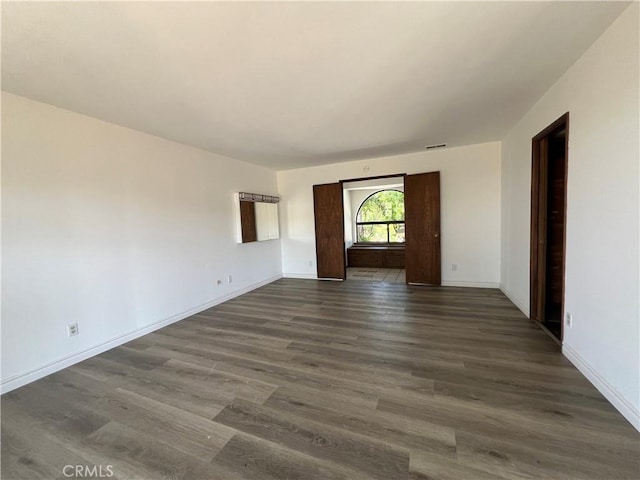 interior space with dark wood-type flooring