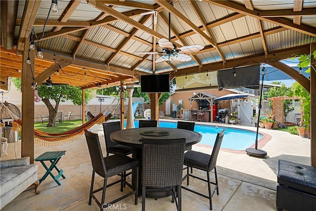 view of pool featuring a gazebo, a patio, and ceiling fan