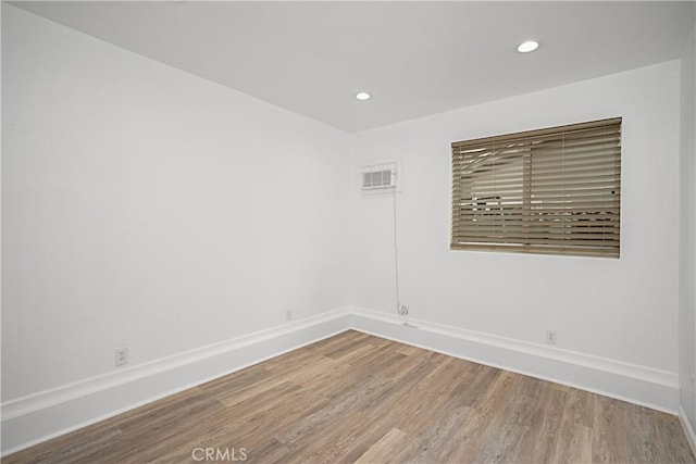 unfurnished room featuring wood-type flooring