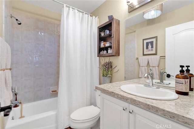 full bathroom with vanity, shower / bathtub combination with curtain, and toilet