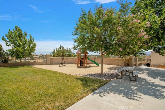 view of play area featuring a lawn