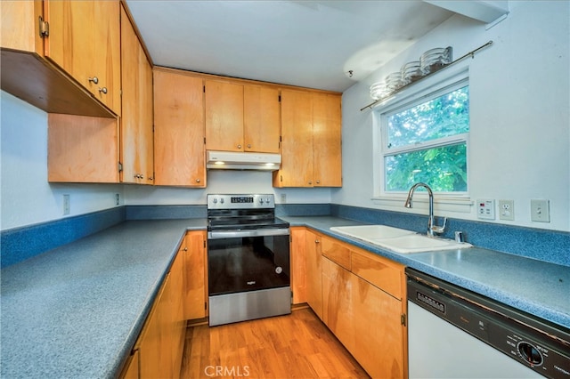 kitchen with light wood-type flooring, sink, white dishwasher, and stainless steel electric range