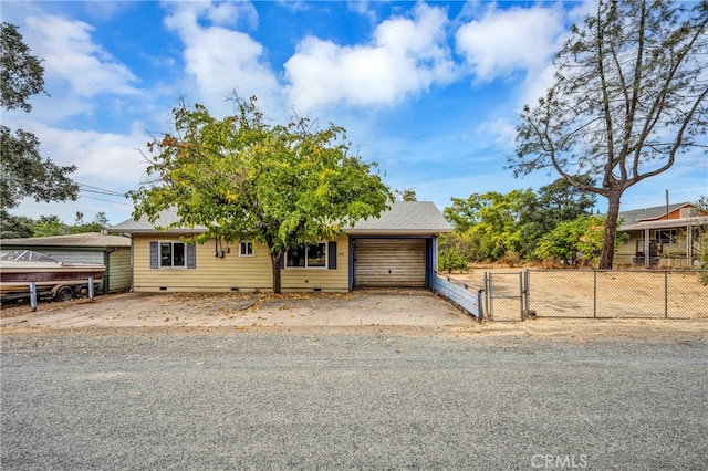 view of front of property with a garage