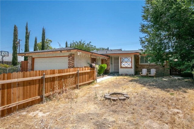 ranch-style home with a garage