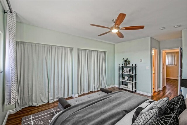 1108 Camino Real Unit 510, Redondo Beach, CA 90277 - bedroom with wood finished floors, baseboards, and ceiling fan