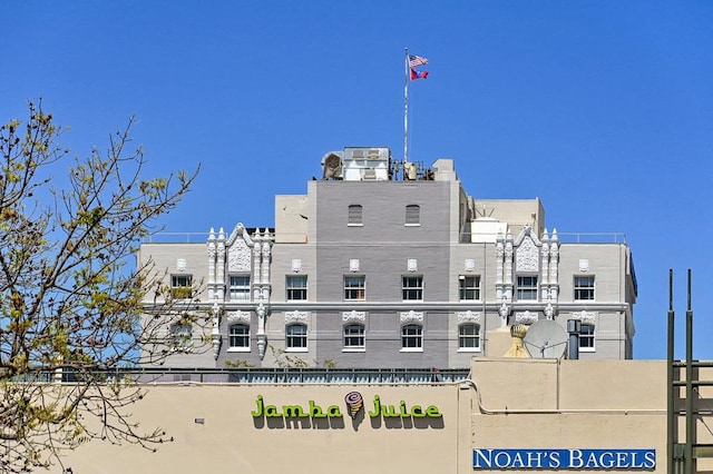 view of building exterior featuring central air condition unit