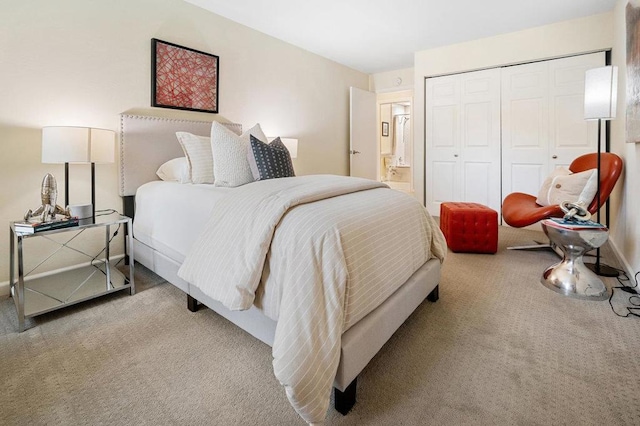 carpeted bedroom featuring a closet