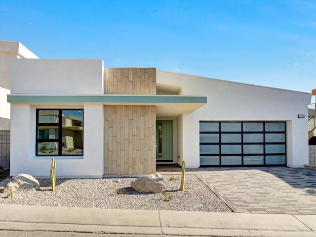 modern home featuring a garage