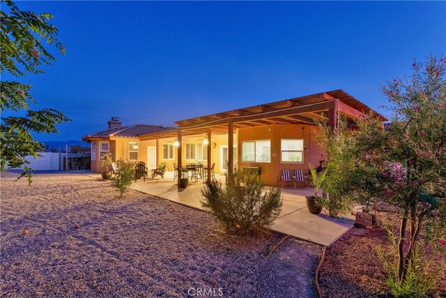 back of house featuring a patio