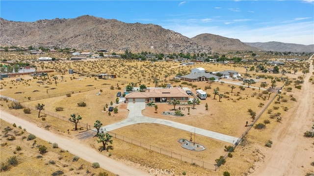 birds eye view of property featuring a rural view and a mountain view