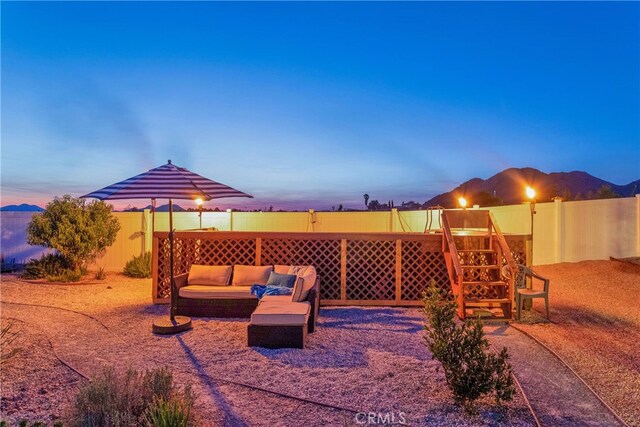 view of patio terrace at dusk