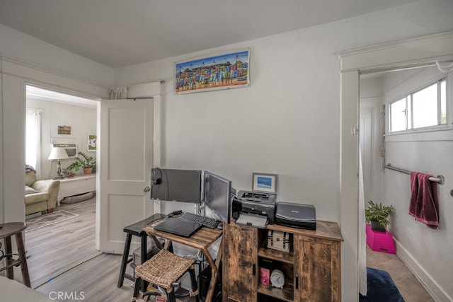 home office featuring light hardwood / wood-style flooring