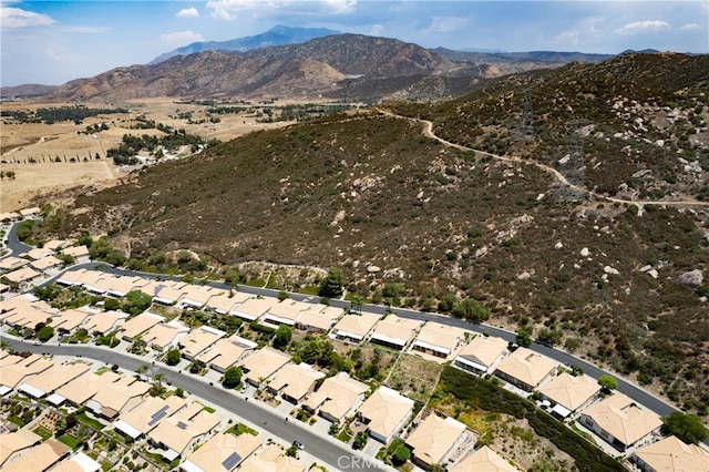 birds eye view of property featuring a mountain view