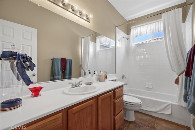 full bathroom featuring tile patterned flooring, shower / bath combo, toilet, and vanity