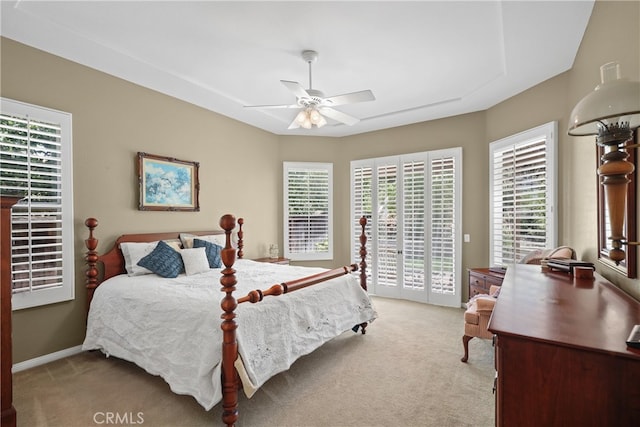 carpeted bedroom with access to outside and ceiling fan