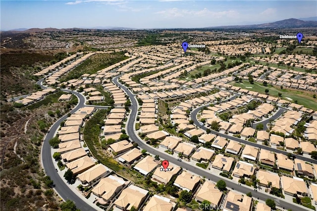 bird's eye view with a residential view and a mountain view