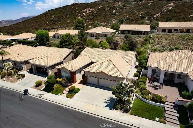 aerial view featuring a residential view and a mountain view